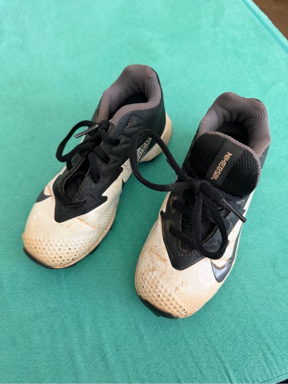 Nike Kids Cleats in White and Black with Gray Lining